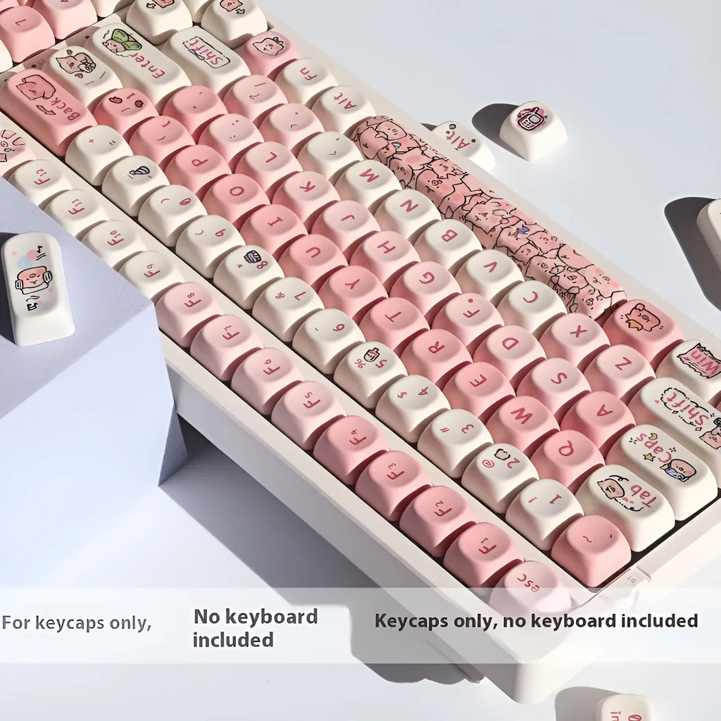 Pink PBT keycap set with 3D sublimation pig design and keycap puller.