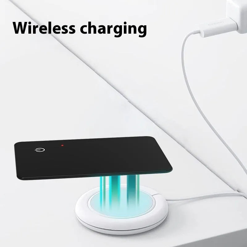 Black rectangular pet tracker card with hanging hole, showing NFC and wireless charging features
