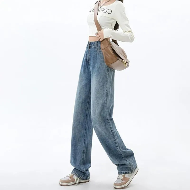 Women's retro blue high-waisted wide-leg denim jeans on a hanger, showing the straight-leg cut.