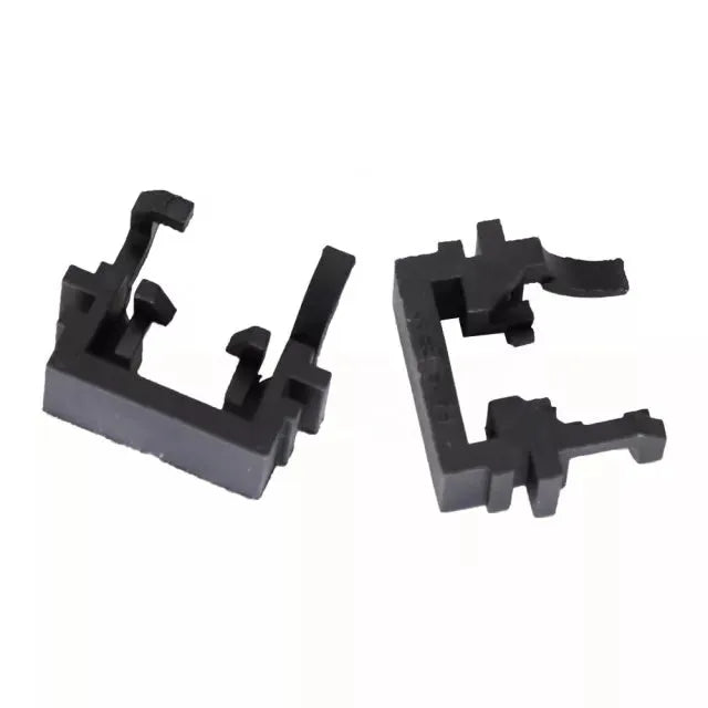 Black plastic Ford headlight adapter for H1 halogen to LED conversion