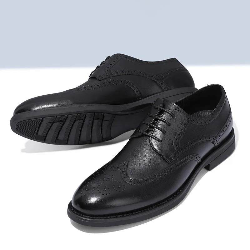 A pair of men's classic black brogue business shoes with a PU leather upper.
