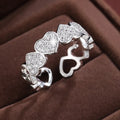 Geometric gold couples ring with heart engraving on an adjustable open band