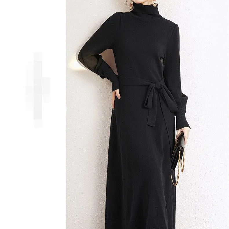 Rose red loose turtleneck knit dress with long sleeves and an elastic waist.