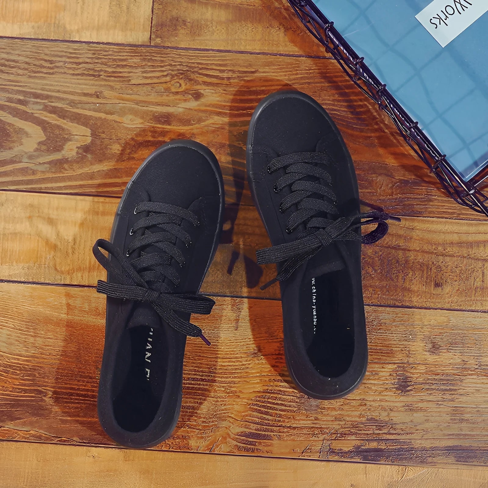 All-black women's canvas lace-up work shoes with flat rubber soles