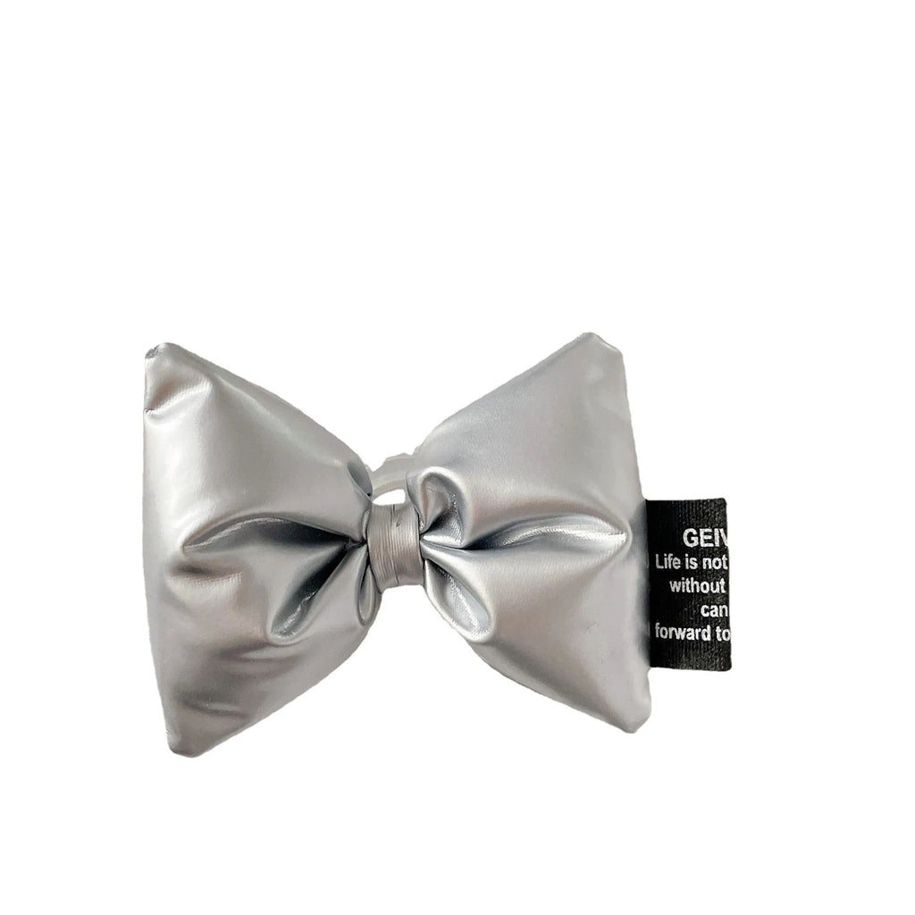Girl's leather bow lazy bracket with transparent support in black, shown on a plain background