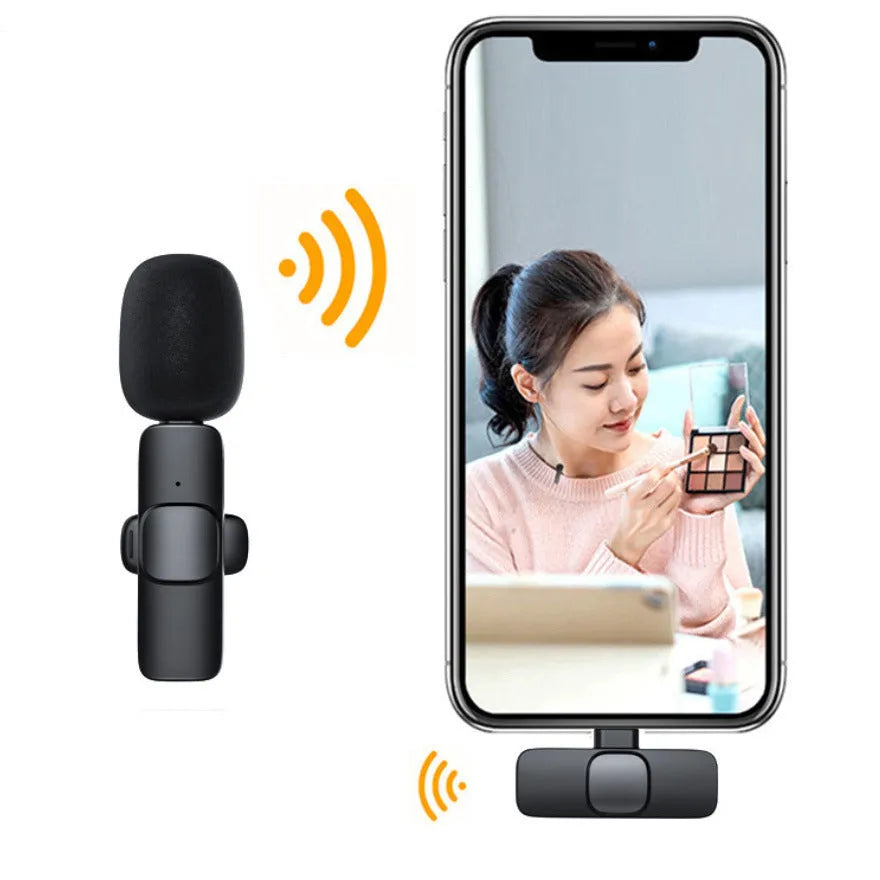 Wireless lavalier noise reduction microphone with clip, receiver, and Type C interface on white background