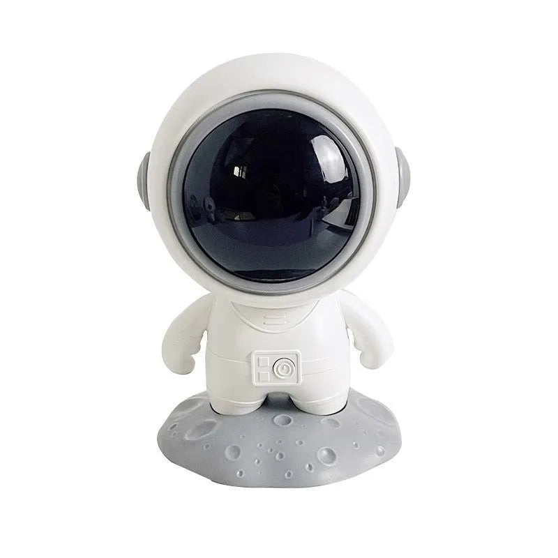 Spaceman moon astronaut Bluetooth speaker in white gold colour as desktop decoration