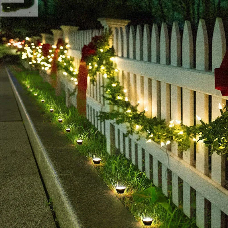 Solar flower pot LED lawn light with IPX4 waterproof rating, 0.2W, warm or white light, placed in garden