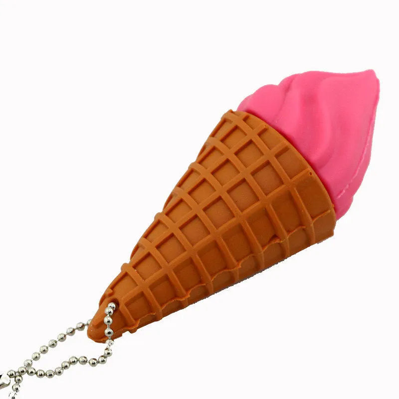 Small pink ice cream cone-shaped USB flash drive on a plain background