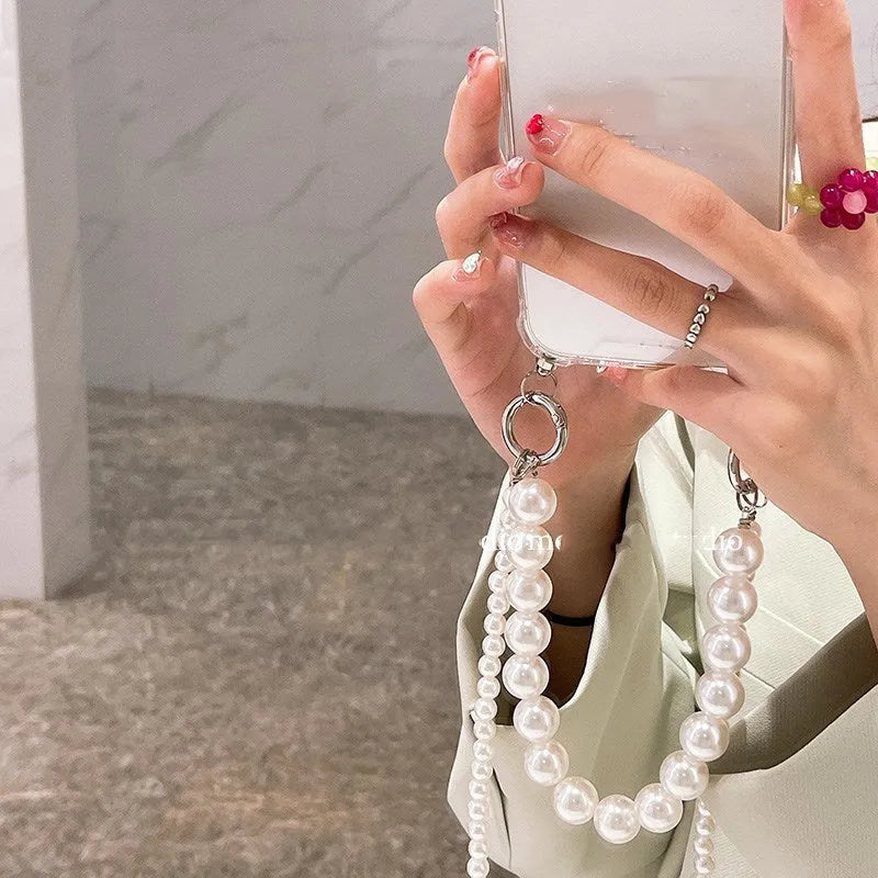 Big Pearl soft mobile phone case in Photo Colour with decorative chain, compatible with multiple iPhone models.