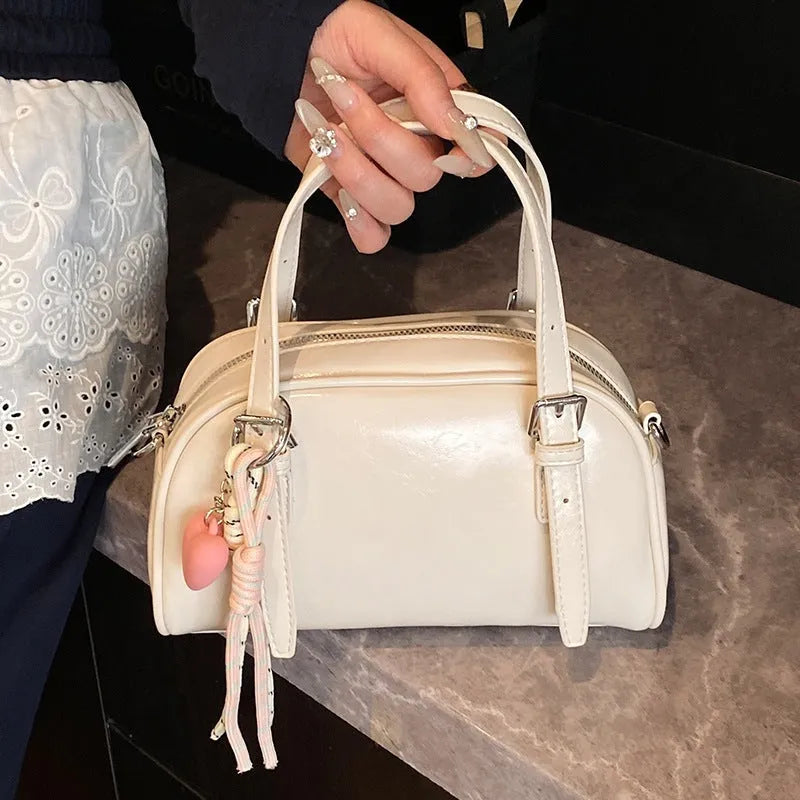 Korean style women's soft PU shoulder bag in shell shape with pendant options