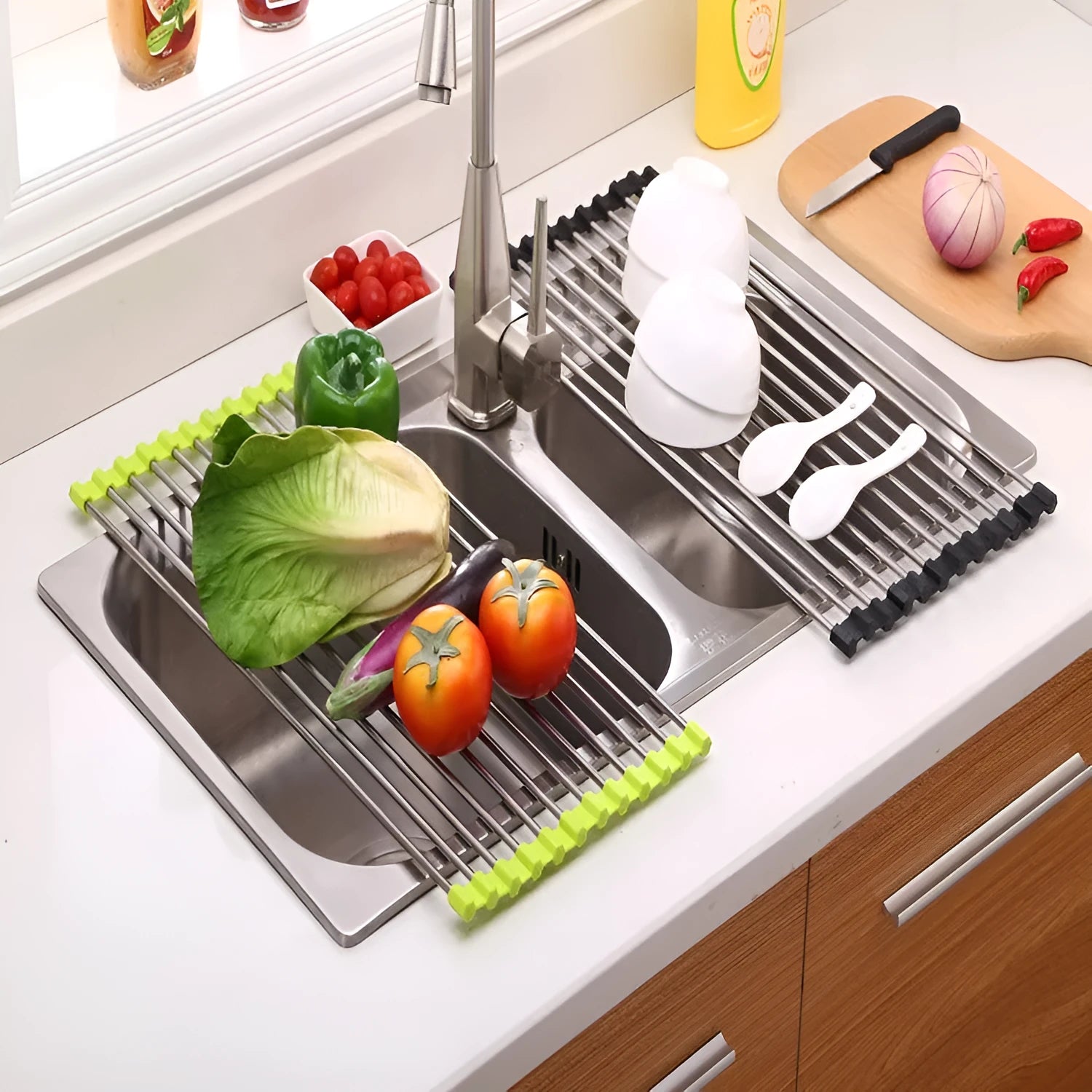 Folding stainless steel and plastic kitchen sink drain rack in blue, shown extended for use and collapsed for storage.