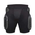 Black cycling protective pants with integrated hip pads, shown in size L for adult mountain bike or BMX use.
