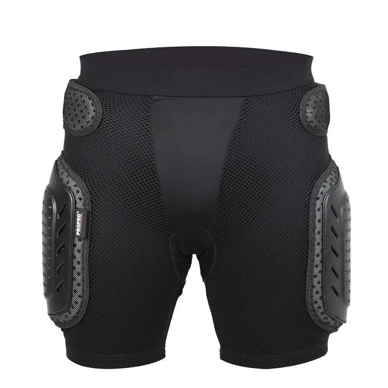 Black cycling protective pants with integrated hip pads, shown in size L for adult mountain bike or BMX use.