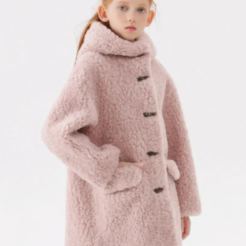 Girls imitation lamb wool mid-length polyester winter coat in pink, grey and white on a hanger