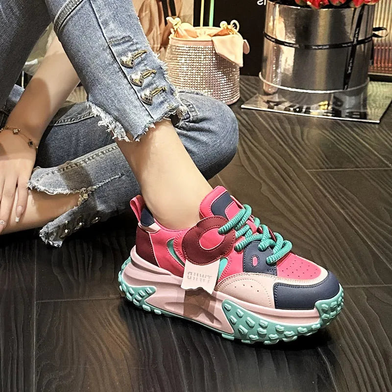 Leather sports casual shoes with thick rubber sole and lace-up fastening in multiple colours.