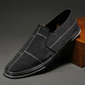 Men's low-top slip-on canvas shoes in khaki colour with a round toe and vulcanised rubber sole.