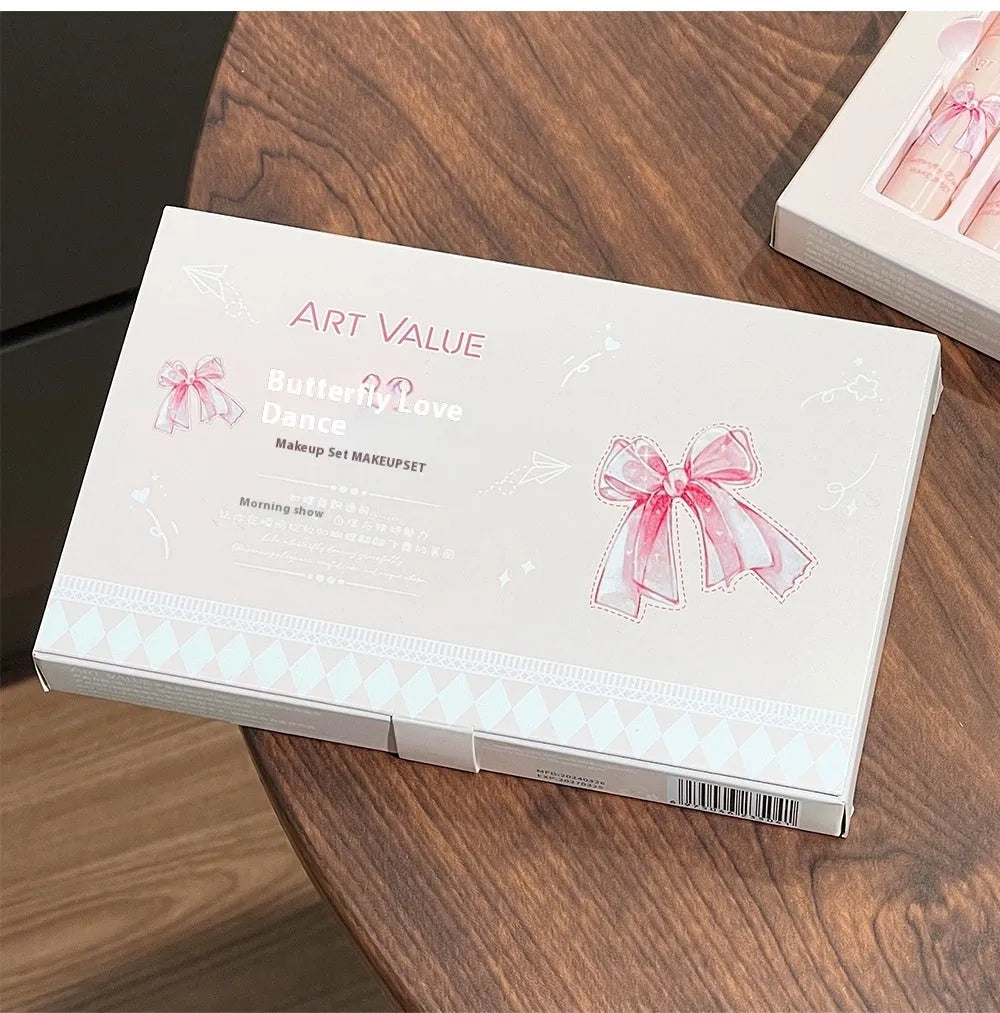 Butterfly Box makeup set with four matte lip muds, powder blusher compact, and necklace.