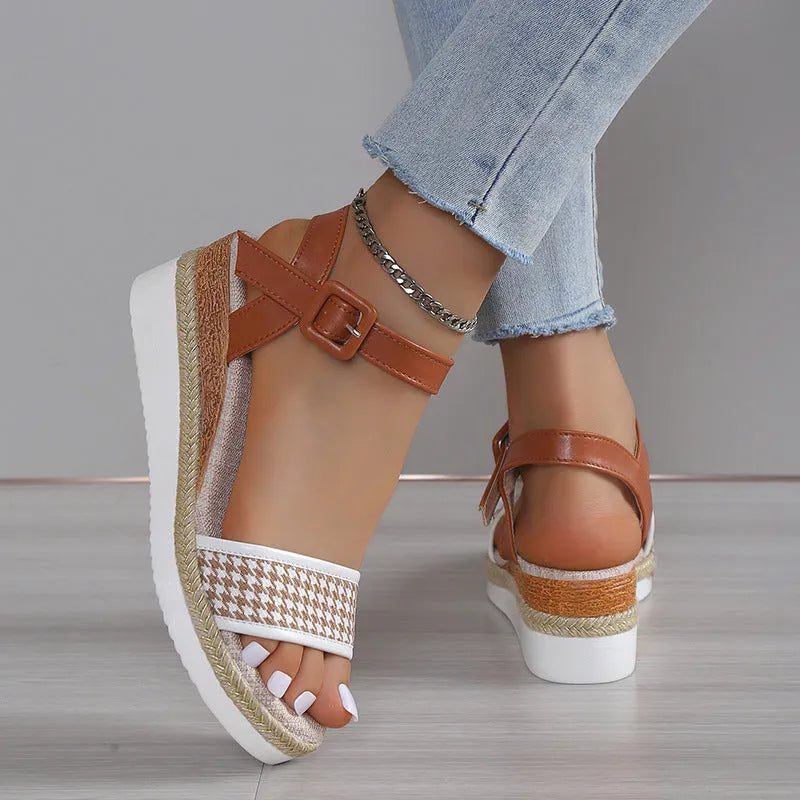 Women's houndstooth print buckle sandals in black with fish mouth toe on light background