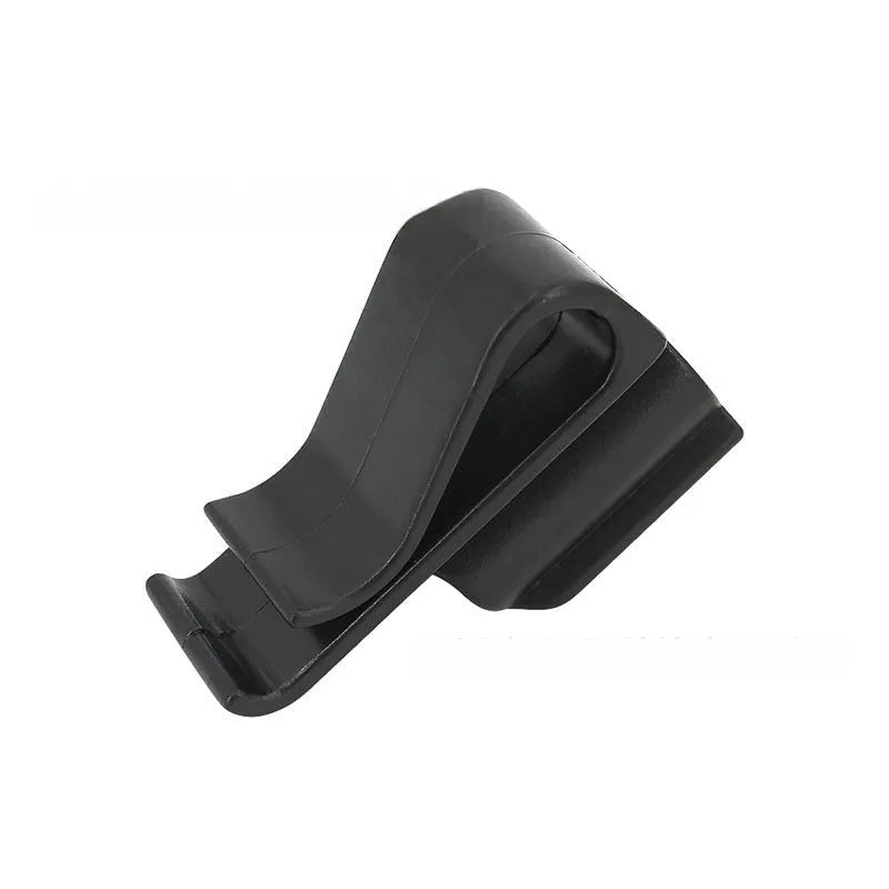 Black ABS plastic golf club clamp holding a golf club shaft