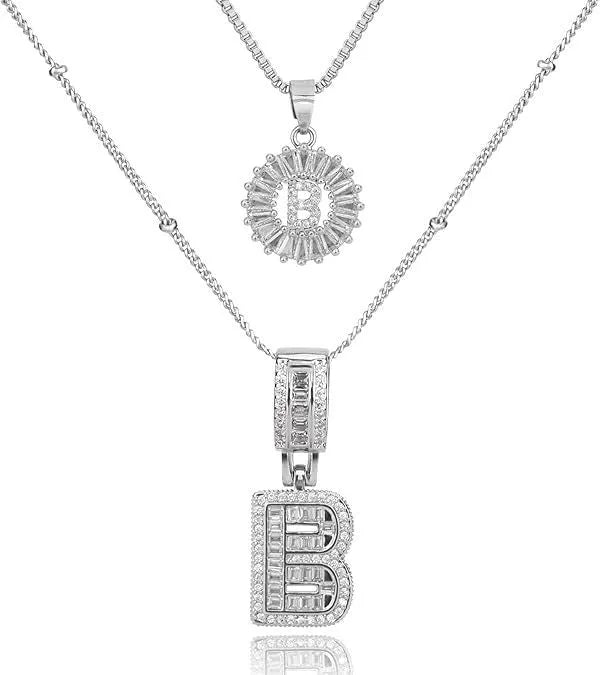 26 English letters copper-plated gold diamond initial pendant necklace with adjustable chain on display