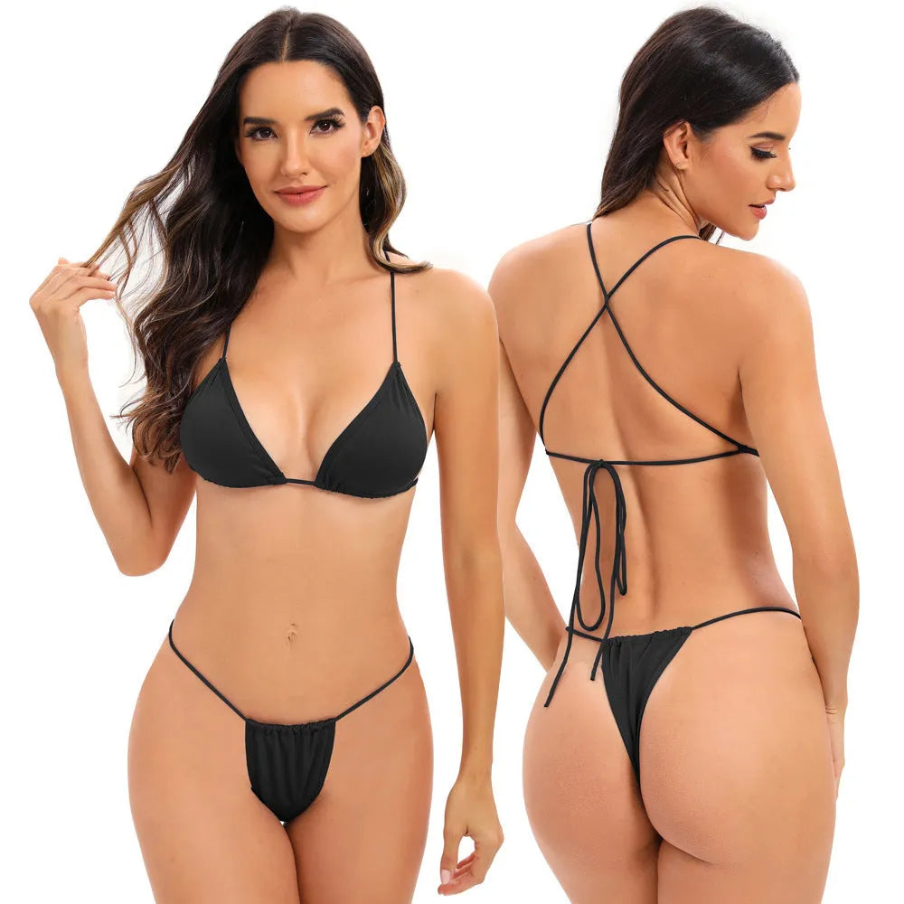 Women's candy coloured cross strap bikini swimsuit on a hanger, showing striped pattern and optional chest pad.