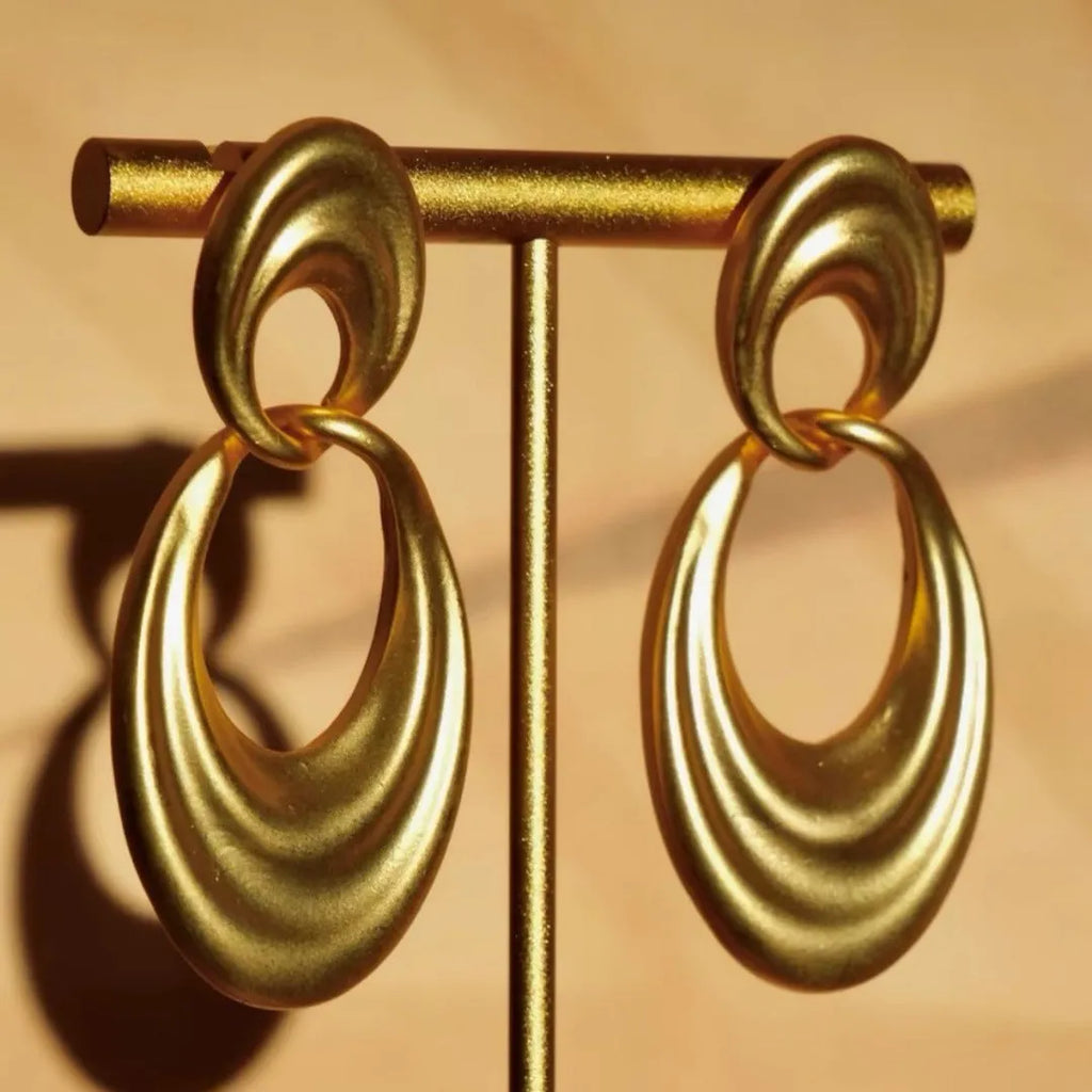 Gold French retro earrings with double circle design on U-shaped copper hoops
