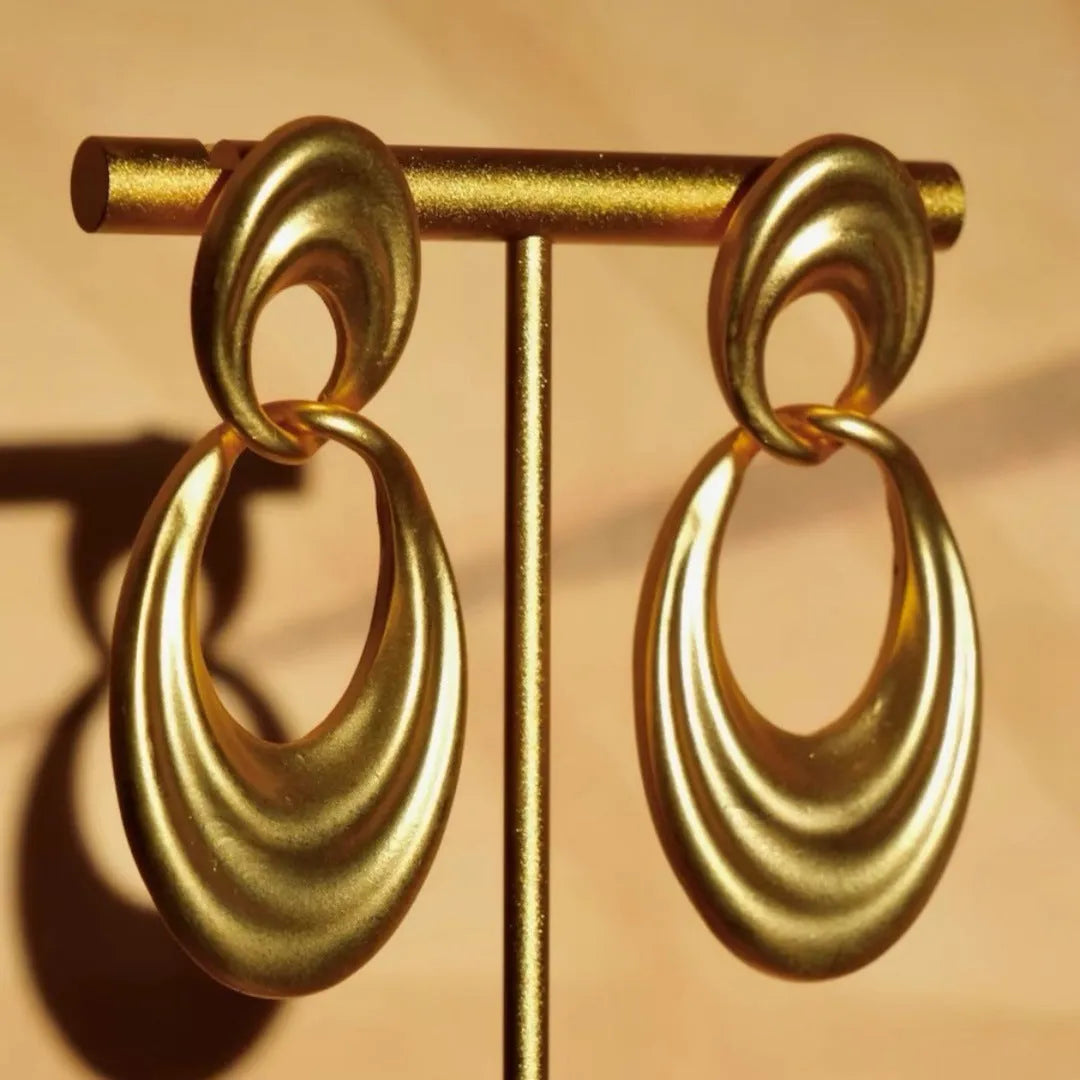 Gold French retro earrings with double circle design on U-shaped copper hoops