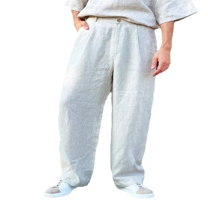 Men's loose linen jogger pants with high waist pleating and straight leg styling in multiple colour options