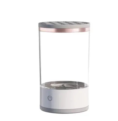 Grey and white electric makeup brush cleaning device with USB charging port