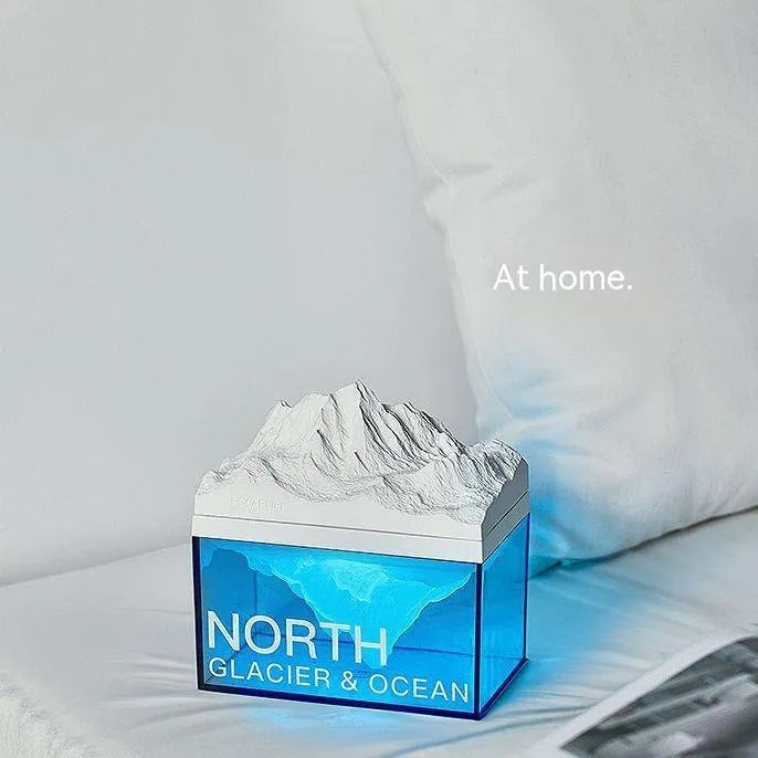 Glacier night light Bluetooth speaker with solid colour glacier pattern on bedside table