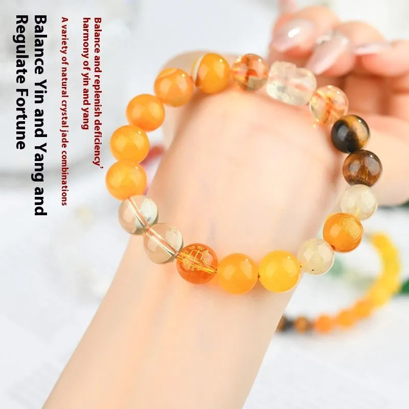 Handmade five elements natural crystal bracelet with geometric beads in gold, wood, water, fire, or soil colours.