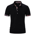 Men's navy blue cotton blend polo shirt with a turnover collar and short sleeves on a hanger.