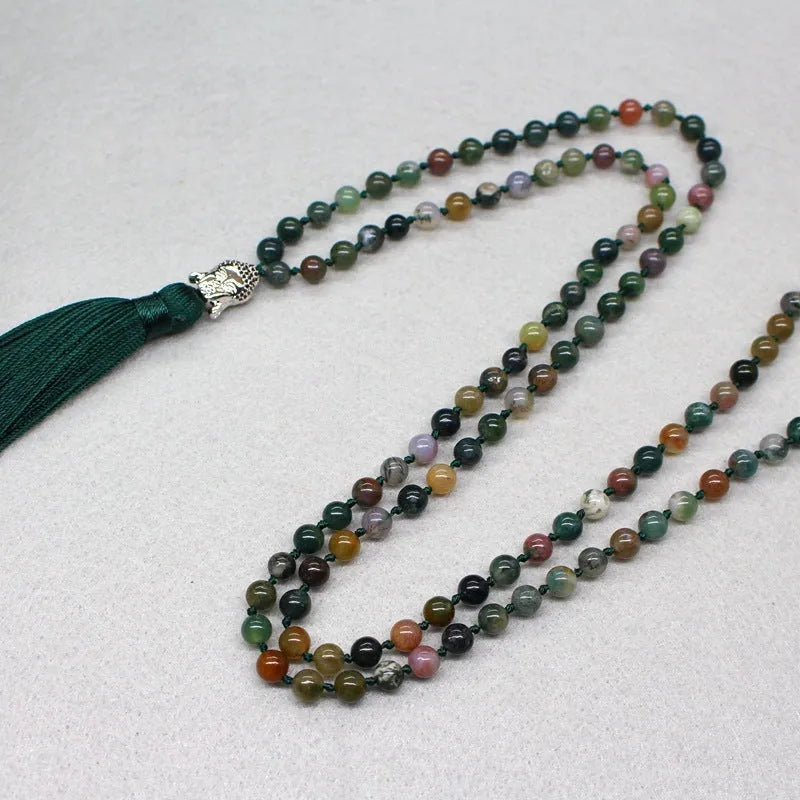 108-bead agate bracelet with 6mm geometric beads on a white background.