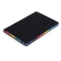 Rainbow side A5 notebook with PU leather back cover and 100g Daolin paper, black colour option, on a flat surface