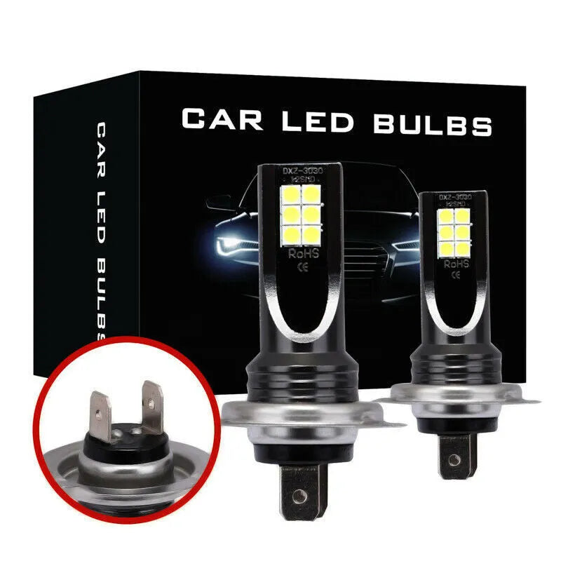 Close-up of an H7 LED fog light bulb with aluminium housing and multiple small LED chips visible.