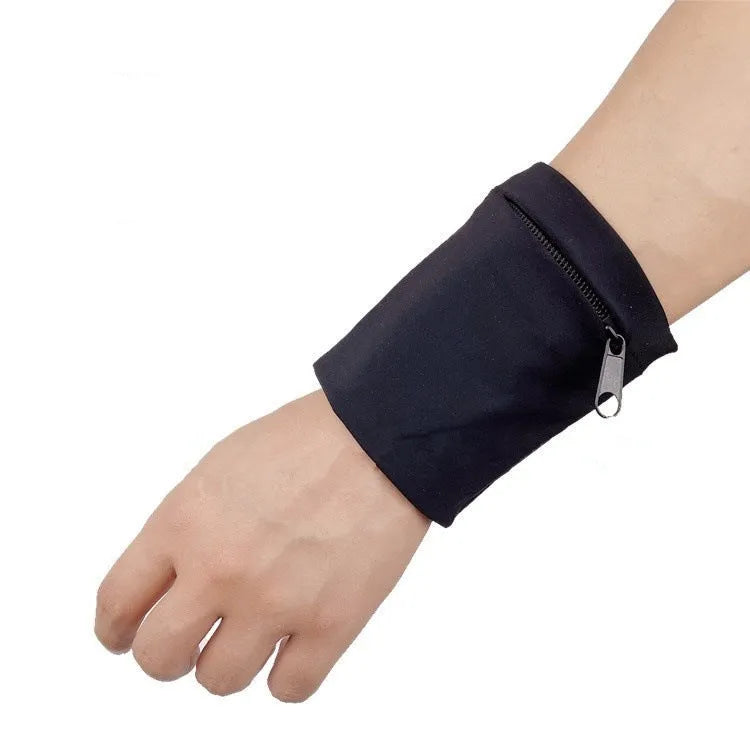 Wrist bag armband sleeve showing 10cm by 10.5cm phone compartment and protective packaging.