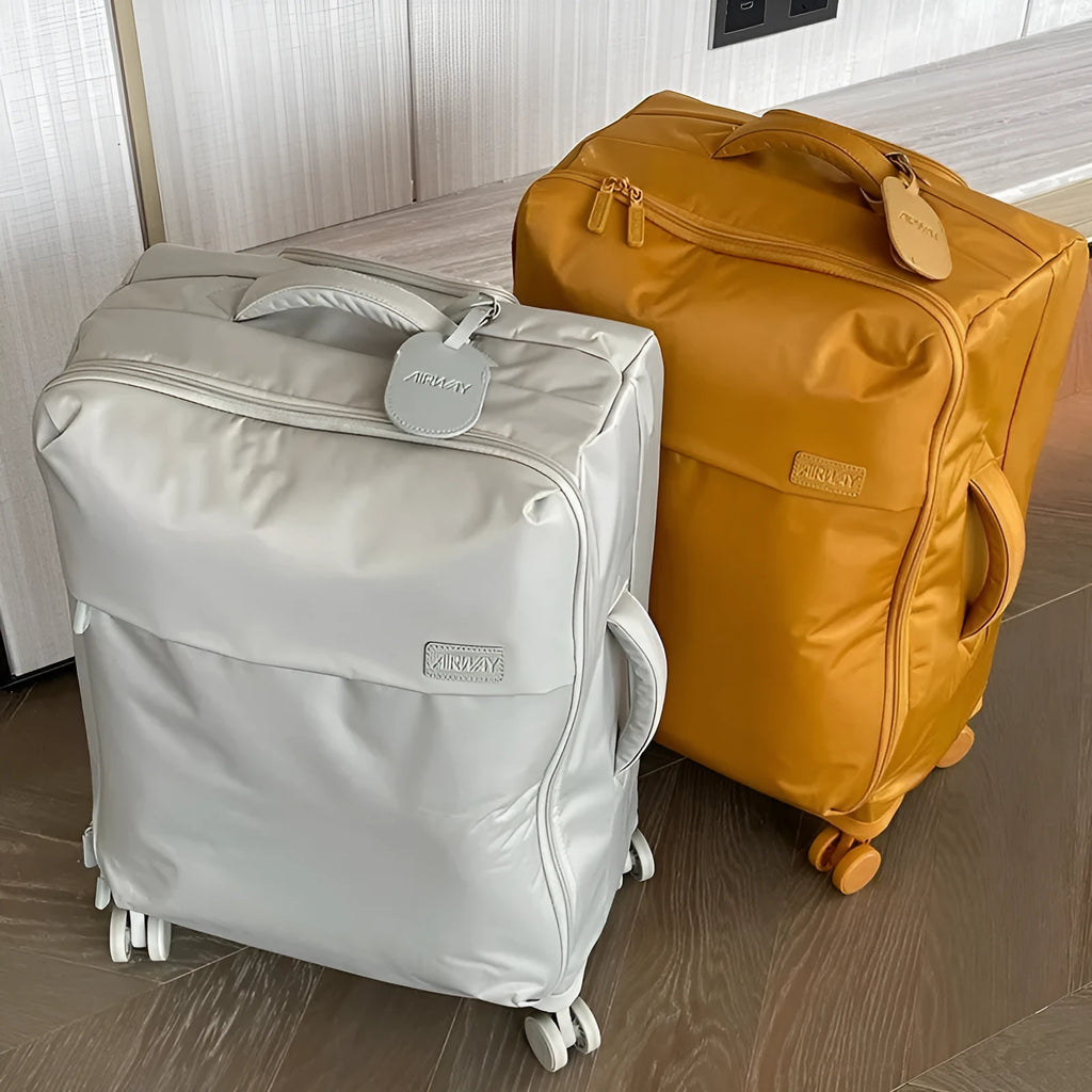 Ultra-light waterproof Oxford cloth suitcase in bluestone green with universal wheels, shown in 20-inch size