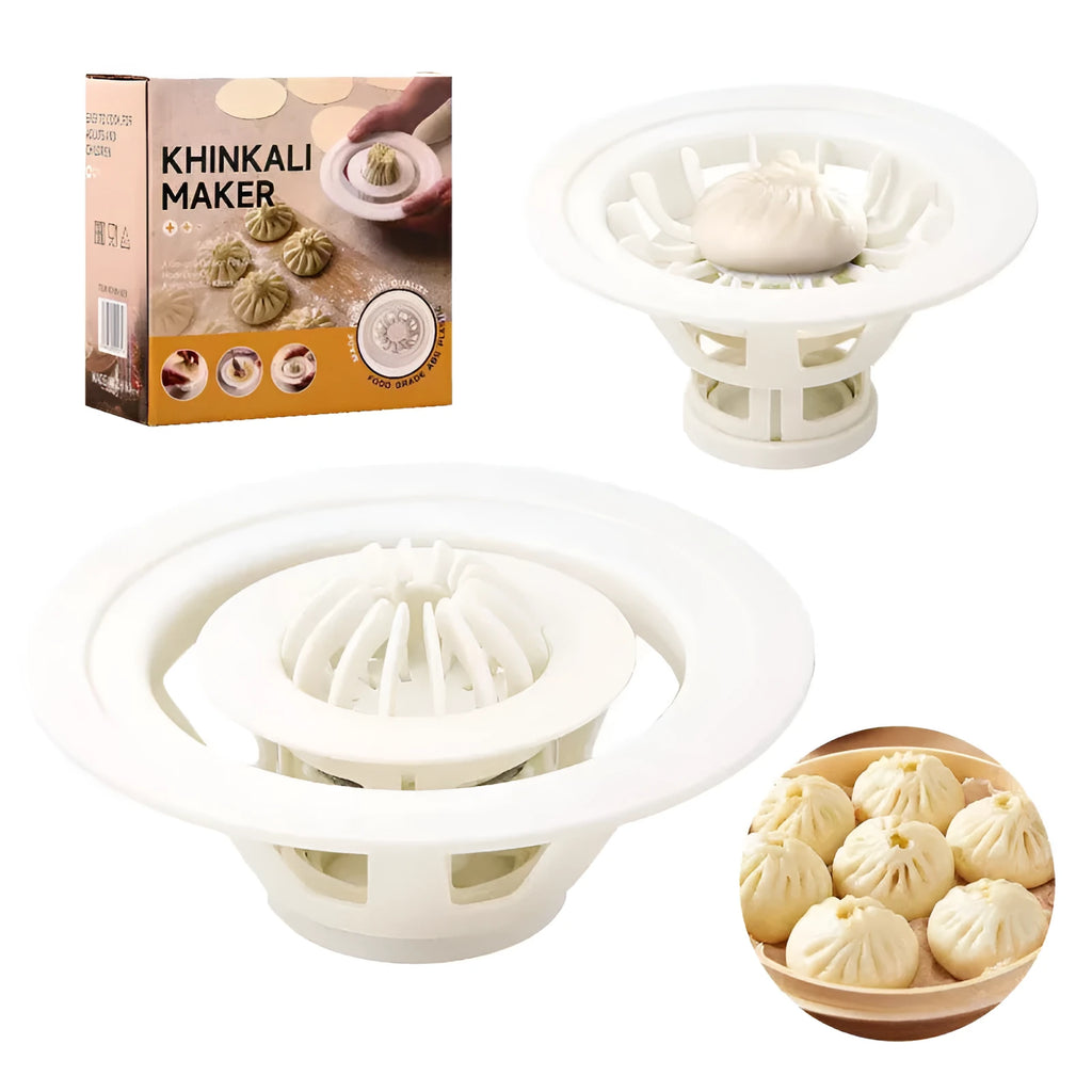 Set of four black plastic steamed bun and dumpling shaping moulds on a kitchen surface.