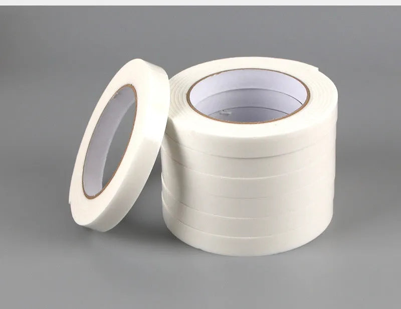 Roll of 3mm thick white foam double-sided adhesive tape with clear BOPP liner, showing width options.