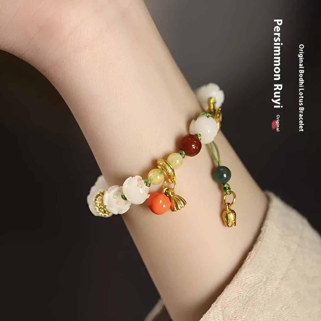 White jade Bodhi bracelet with lotus and pumpkin beads on open rope with ring clasp
