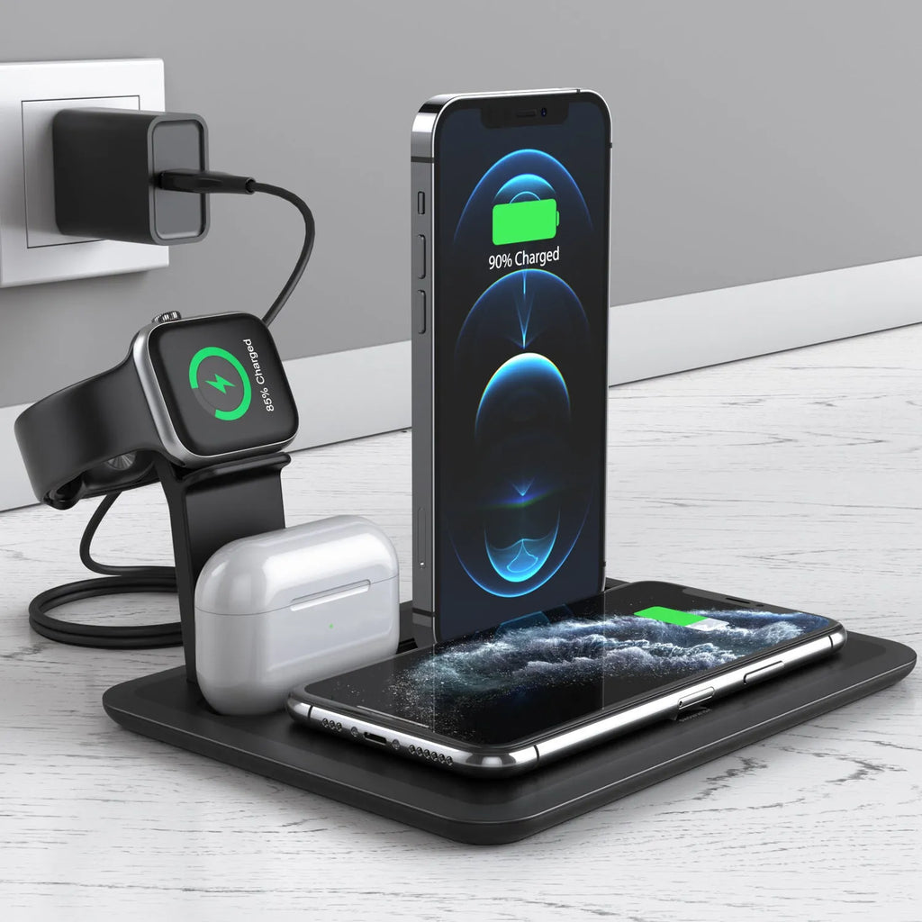 Black desktop wireless charging station with phone on pad, watch and headphone cables plugged in.