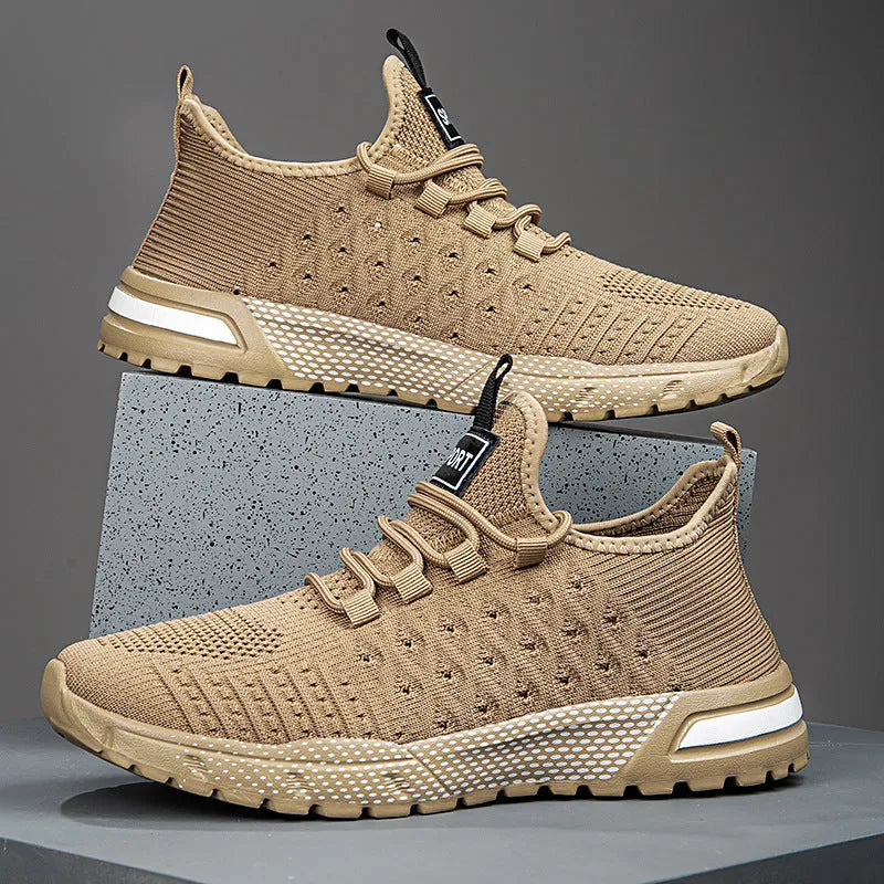 Men's solid colour casual shoes with mesh upper in light grey.