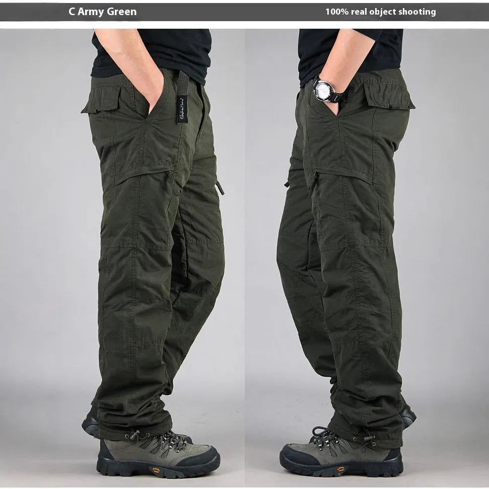 Men's khaki cotton velvet overalls with wool lining, shown with a loose straight-leg fit.