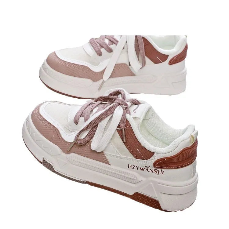 Minority board shoes in beige with thick rubber soles, cross shoulder straps, and front lace-up closure.