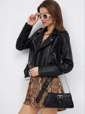 Black women's retro style PU leather coat with regular sleeves on a street fashion background