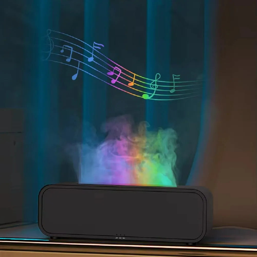 Black Flame Dynamic Aroma Diffuser with LED flame light display and remote control on a desk.
