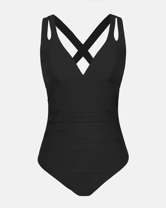 Solid colour one-piece bikini swimsuit with cross shoulder straps on a mannequin, showing front view.