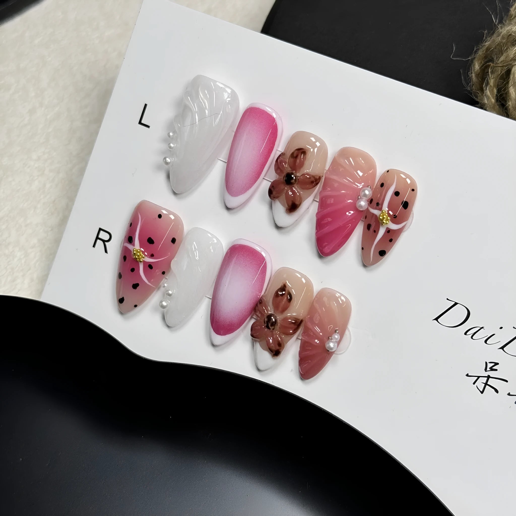 Hand-painted three-dimensional carved plastic nail patches with embossed candy patterns in almond shape