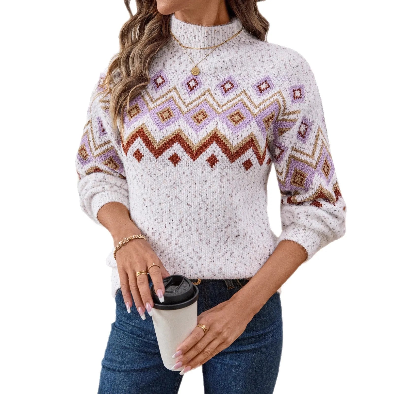 White women's sweater with black geometric jacquard pattern, half turtleneck, and loose long sleeves.